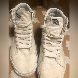 Vans. White high top